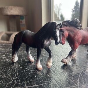 Black and Red collecta drafts horses